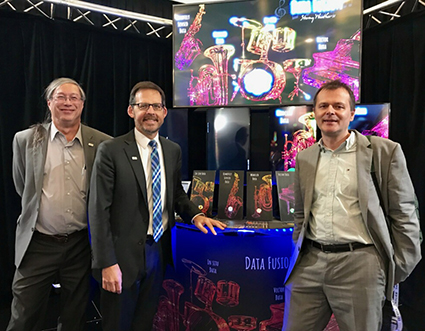 CIESIN director Robert Chen (left) stands with Lawrence Friedl, NASA, (middle) and Steffen Fritz, IIASA